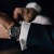 a person with a suit and watch on