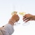 people holding wine glasses